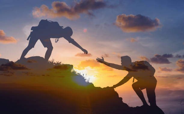 istock Friend asking for help. Helping hands. Friendship.  Teamwork. 1638506959