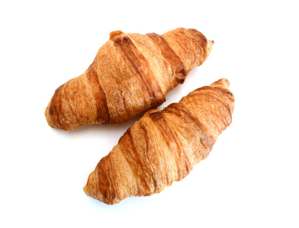 istock Fresh and tasty croissant over white background 1638512304