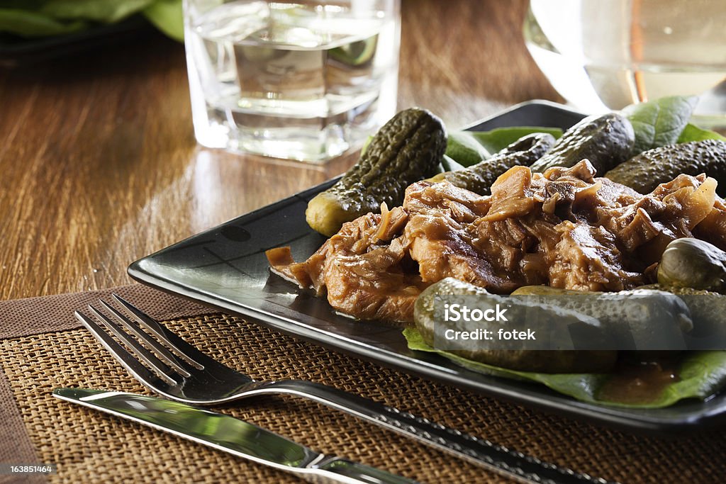 Pork loin with mushroom sauce Pork loin with mushroom sauce. Dark light 2013 Stock Photo