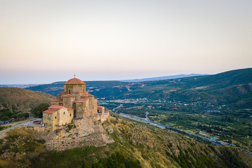 Gondola on a cable winch as access to the Monastery Agia Triada (Holy Trinity) in Meteora which was built high on the top of a rock in the mountain landscape near Kalambaka, Greece, copy space