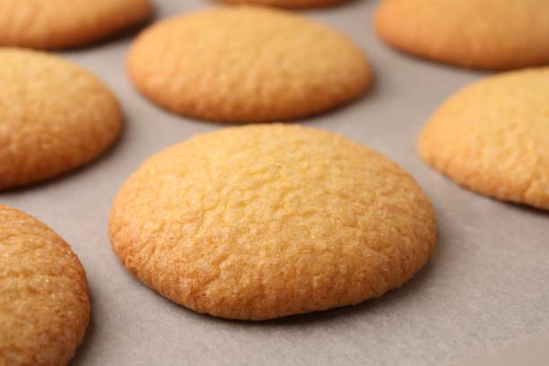 istock Delicious Danish butter cookies on baking tray, closeup 1638555591