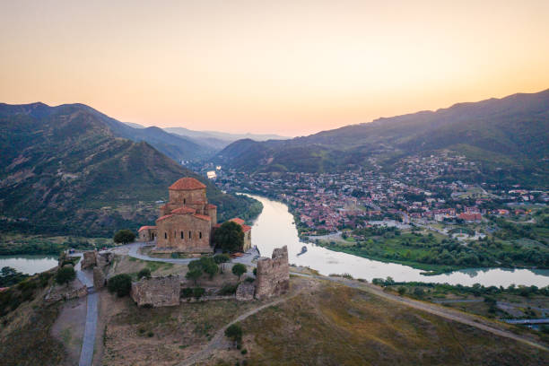istock Aerial view at Jvari Monastery with Mtskheta town and river background. 1638555610