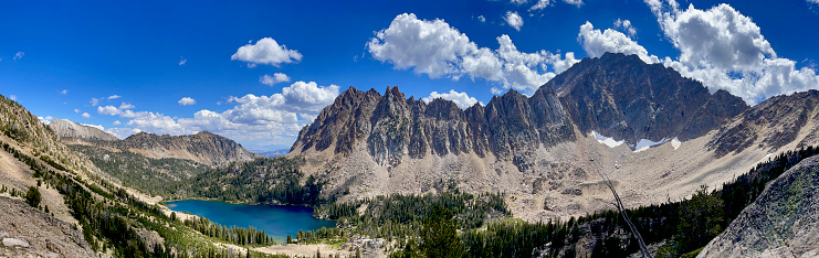 Quiet Lake Below Serrate Ridge and Castle Peak