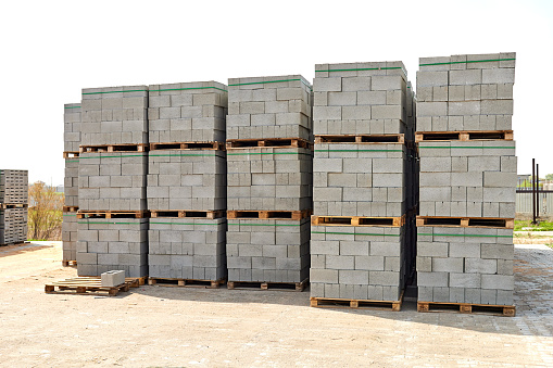 hollow concrete wall blocks assembled on pallets in the workshop