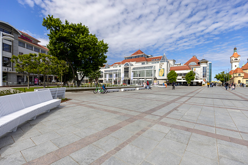 Sopot, Poland - June 2, 2023: Sopot's Friends Square with Spa House and Sopot Lighthouse at the Baltic sea, near the Sopot Pier on the Gdansk Bay
