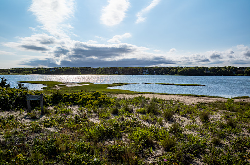 Various views of Bournes Pond in East Falmouth, on Cape Cod, MA.  Bournes Pond is a saltwater pond where residents enjoy fishing and boating during the summer months.
