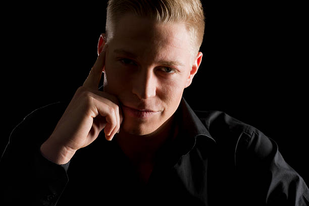 istock Low key portrait of young attractive man. 163869596