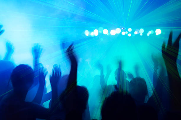 istock People dancing to the disco beat. 163869711