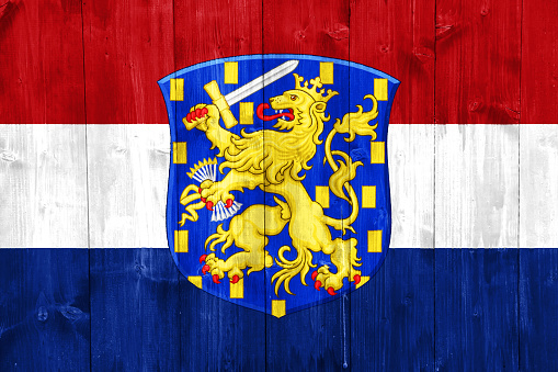 Flag and coat of arms of Caribbean Netherlands on a textured background. Concept collage.