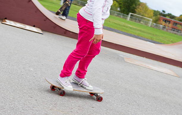 istock Young Girl Skateboarding 163873485