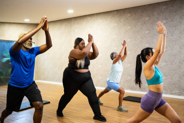 istock People in a yoga class 1638739051