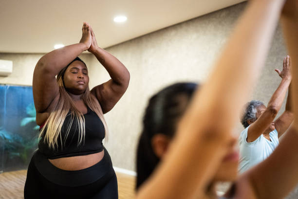 istock Young woman in a yoga class 1638739063