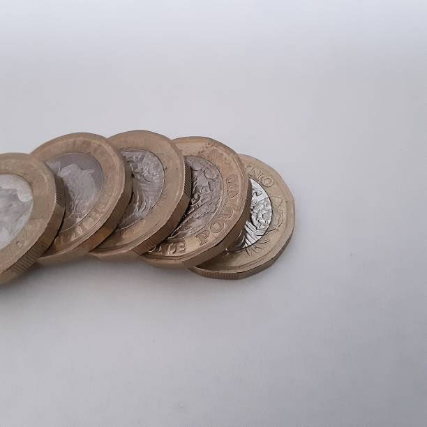 istock Coins from Northern Ireland isolated on white 1638747350