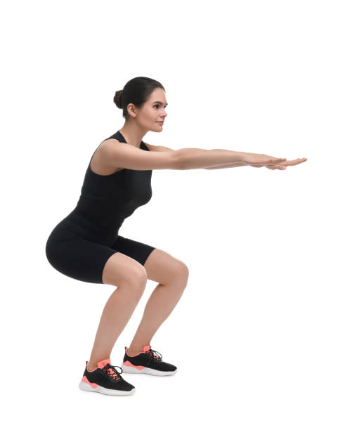 istock Woman doing squats on white background. Morning exercise 1638749868