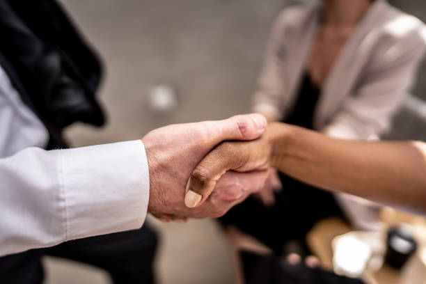 istock Close-up of human hands each other greeting 1638754136