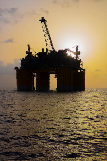 istock Offshore platform at sunset in Gulf of Mexico 1638772521