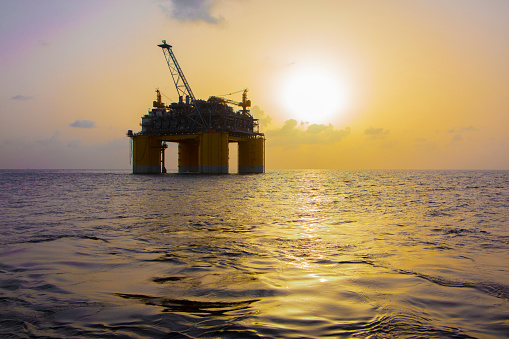 Offshore platform at sunset in Gulf of Mexico in United States, Louisiana, Gulf of Mexico