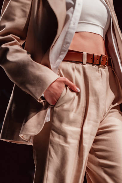 istock Beige classy costume, pants and jacket on black background. 1638773607