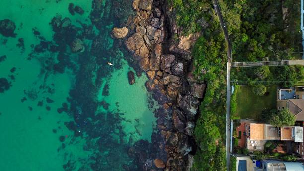 istock Rocky coast line against sea 1638773644