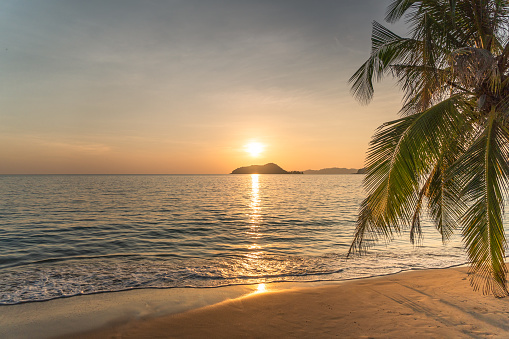 Golden hour at sunset on tropical beach in Ko Chang, Trat, Thailand
