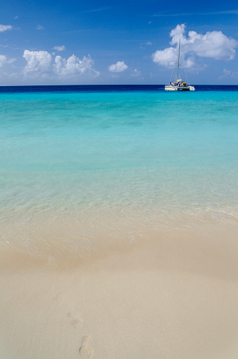 Crystal clear, turquoise waters on a beach on the island of Klei in Willemstad, Curaçao, Curaçao