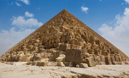 Egyptian pyramids in sand desert and clear sky in Giza, Giza Governorate, Egypt