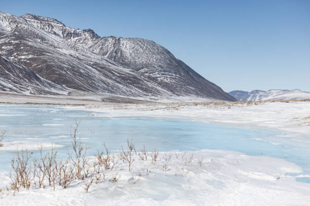 istock Frozen Lake with mountains in Alaska 1638781260