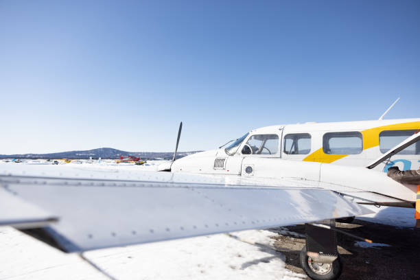 Airplanes parked at a small airport. Light aircraft on a private airfield