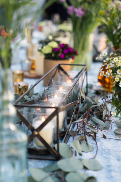 istock Candles in holder on table for rustic wedding decorations 1638787847