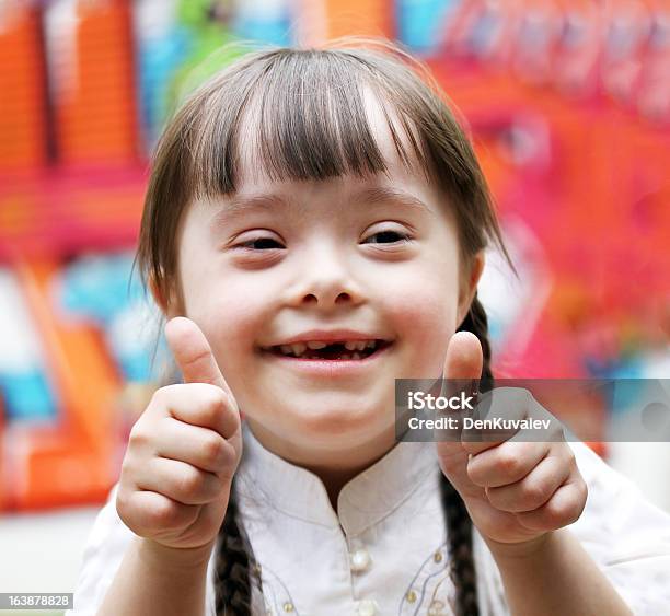 Portrait Of Girl Stock Photo - Download Image Now - Child, Down Syndrome, Playground