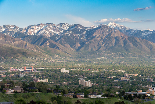 View of the snow capped mountains surrounding Salt Lake City in Salt Lake City, Utah, United States