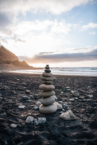 Vertical Photo of Pile Of Stones On A Beach in Benijo, Canarias, Spain