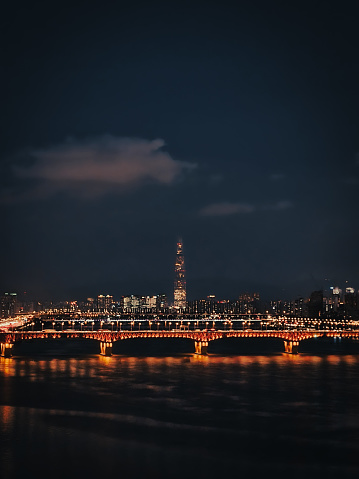 Portrait of Han River and Lotte World Tower in Jamsil, Seoul at night