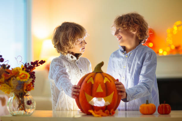 istock Family carving pumpkin for Halloween 1638846550