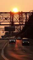 istock Sunset Bridge Traffic 1638854617