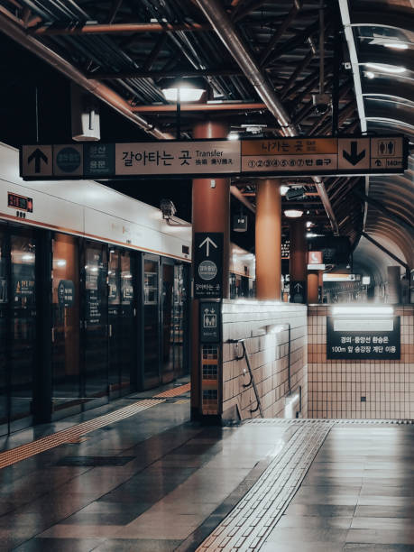 An empty subway station at night, located in the busy district of Seoul, Korea.