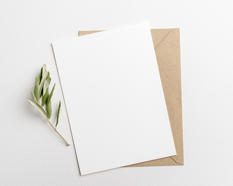 Blank wedding invitation mockup with olive leaf on white background\n5x7 inches Invite mockup, Boho card mockup, A4 Paper, Wedding invitation