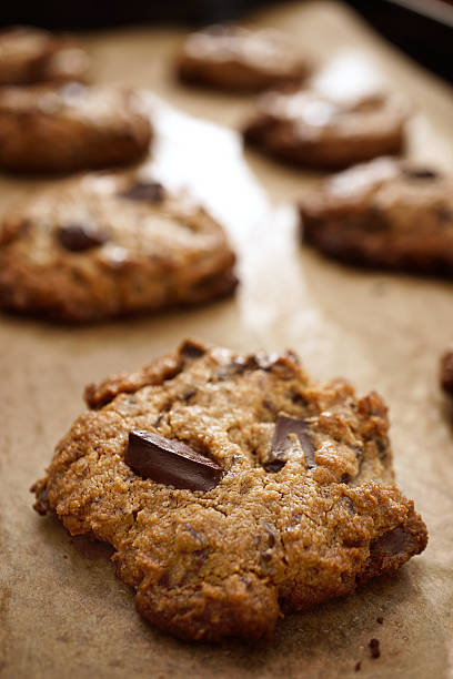istock Flourless Peanut Butter Chocolate Chip Cookies On Baking Sheet 163893604