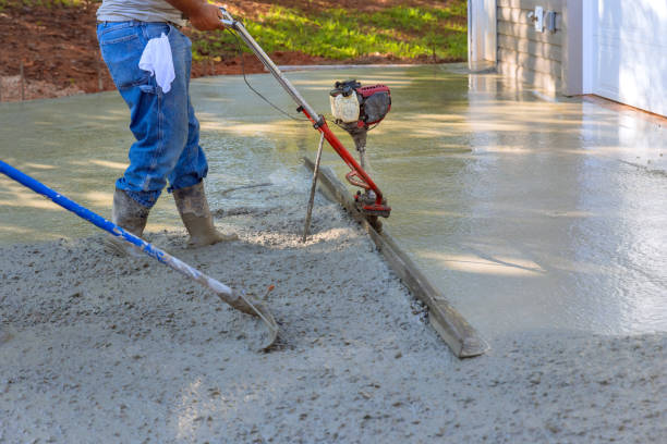 Utilizing tamping machine to align compacted concrete on driveways Utilizing tamping machine to align compacted concrete on new driveways concrete work stock pictures, royalty-free photos & images