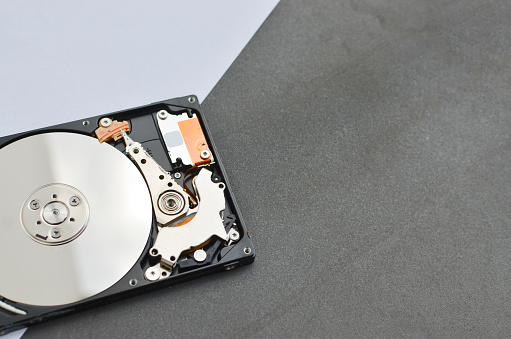 Closeup of a laptop hard drive, symbolizing the importance of service in the age of technology.