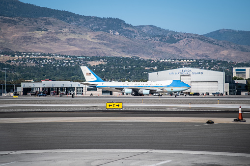 Reno, Nevada - August 25, 2023: Air Force One on the ramp in front of the Nevada Air National Guard hanger at KRNO. President Biden was visiting Lake Tahoe in Glenbrook, NV.