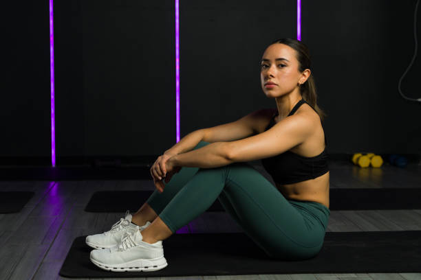 istock Confident athletic young woman looking at the camera after working out at a gym 1638972751