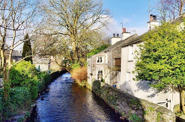 Tree lined stream in Cartmel, Cumbria stock photo