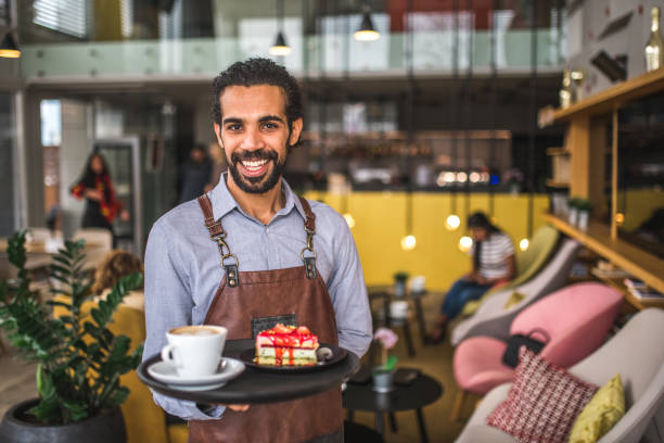 istock Middle Easter Waiter Holding A Serving Tray In A Cafe 1639022453