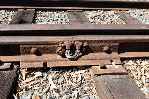 Rusty rail joint detail, with a 4 bolt connecting plate