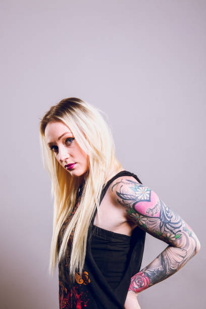 istock Beautiful Young Tattooed Woman 163906397