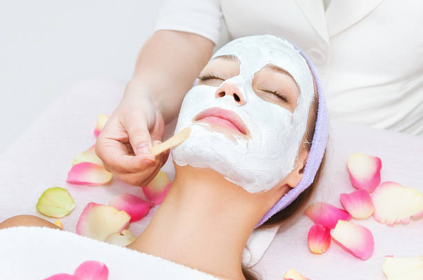 istock Young woman facial therapy 163908690