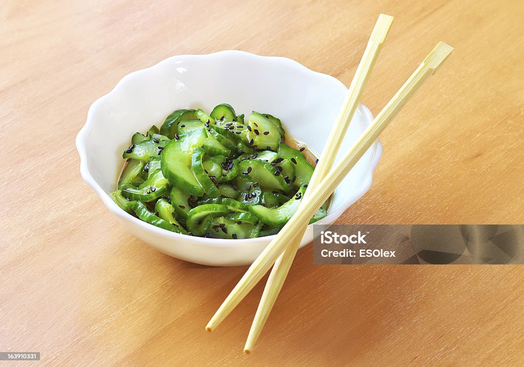 Sunomono. Japanese Cucumber Salad Sunomono. Japanese Salad with Cucumber Chopsticks Stock Photo