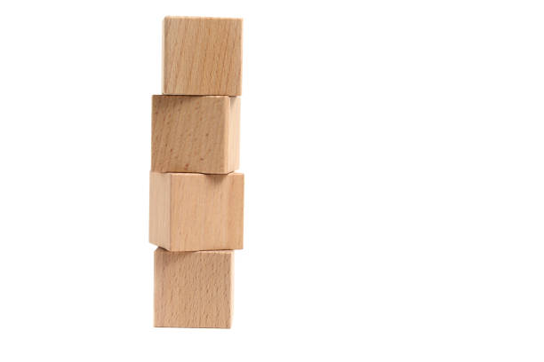 istock Wooden cubes made beech wood white background. 1639111119