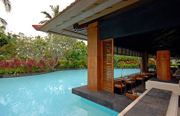 istock pool and asian pavilion on tropical resort (Bali, Indonesia) 163914876
